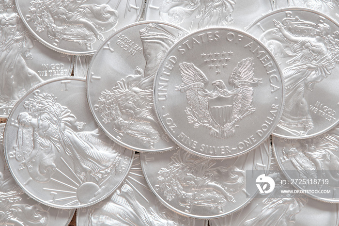 Stack of silver coins american eagle top view