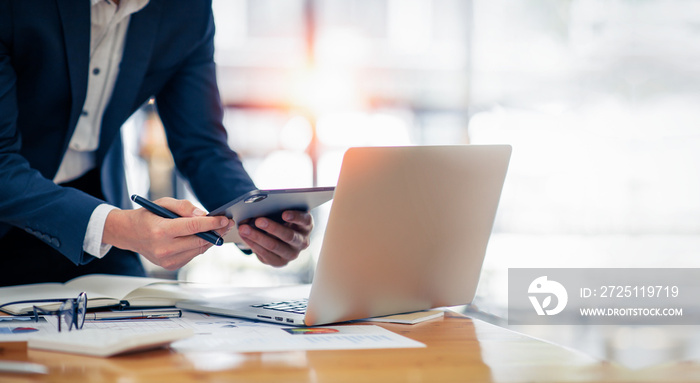 financial report,Businessman working at office with documents on his desk, doing planning analyzing 