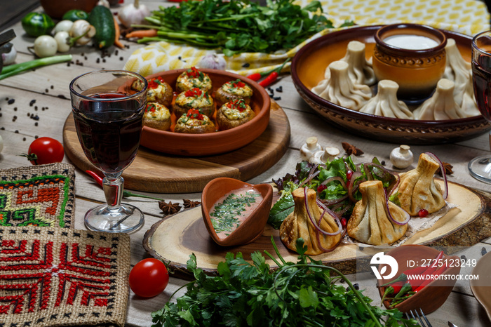 View from above of georgian cuisine on brown wooden table. Traditional georgian cuisine and food - k