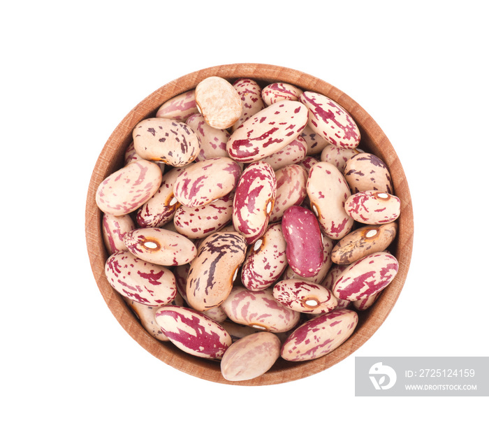 Pinto beans in a wooden bowl isolated on white background, top view