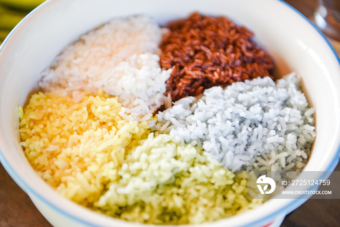 colorful jasmine rice bowl / blue brown yellow green and white rice cooked rice berry food