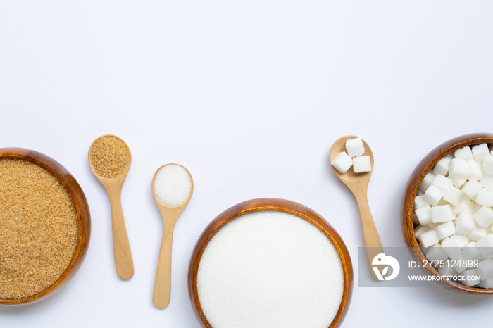 Various types of sugar on white background.