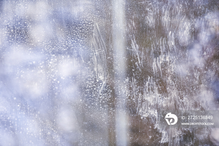 Reflection and stains on dirty window glass