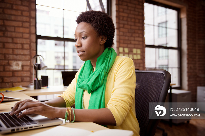 Young woman working in office