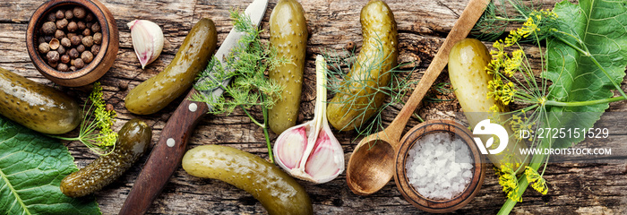 Homemade Pickles On Wooden Table