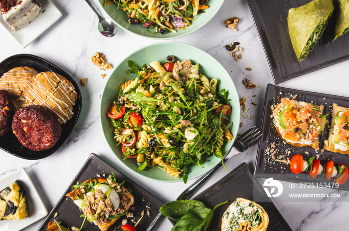 Variety of vegan and healthy dishes on the restaurant table.