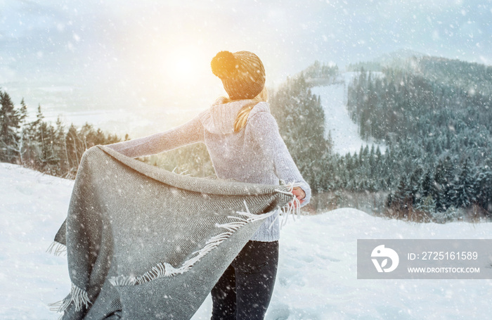 Portrait Happy woman traveler on the snowy of mountain look on t