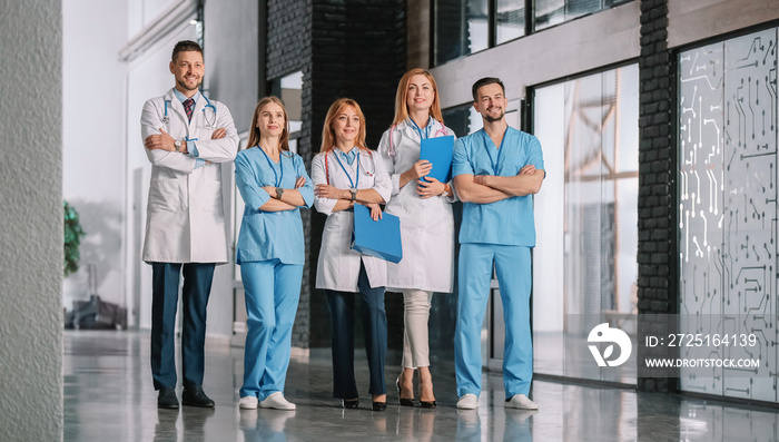 Team of doctors in hall of clinic