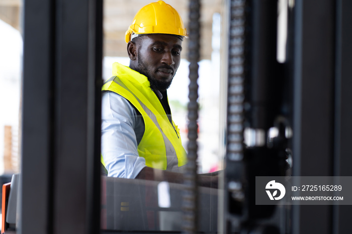 Warehouse man worker driver forklift. warehouse worker driver stacking card boxes by forklift in war