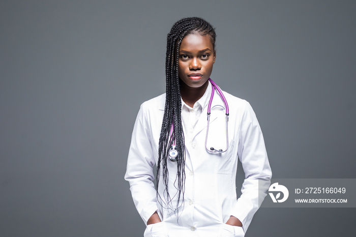 Young African doctor woman isolated on white background