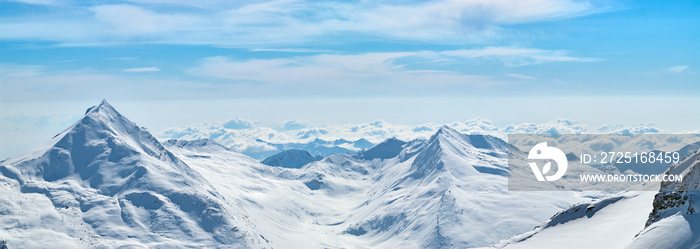 Winter mountains panorama view with the high peaks covered by the snow near Saas-Fee in Switzerland.