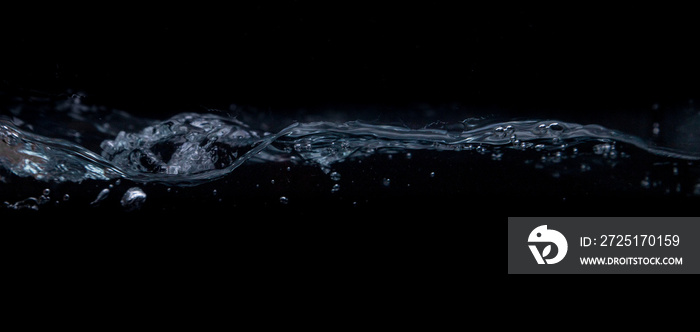 Wave of water on a black background