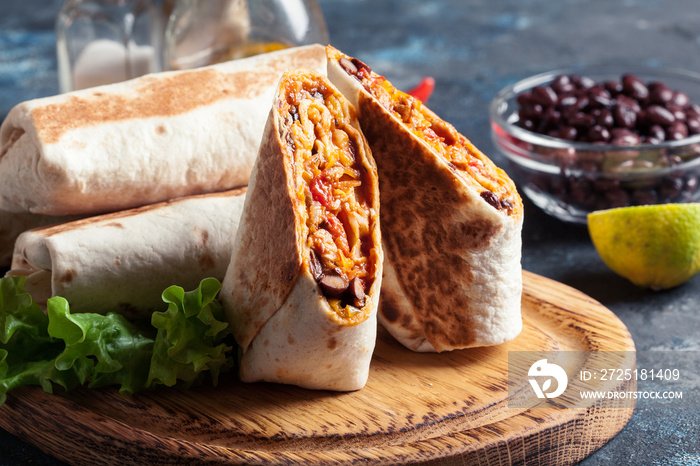 Burritos wraps with mincemeat, beans and vegetables