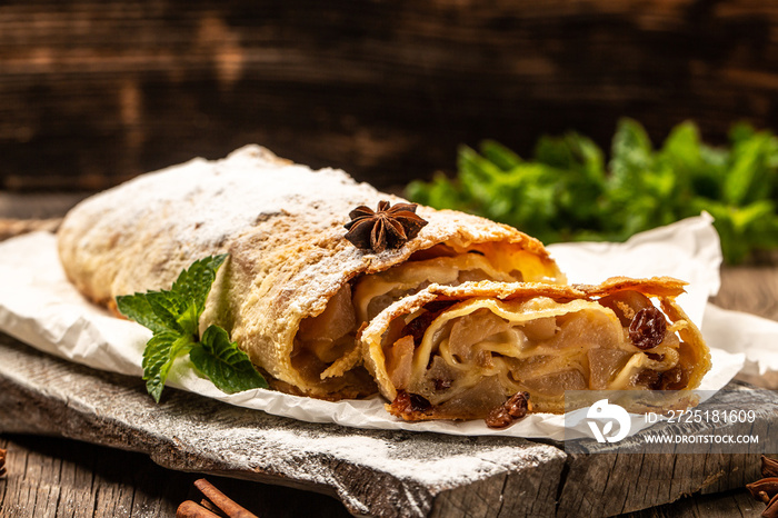 Homemade apple strudel with fresh apples and powdered sugar. classic and probably the best known Vie