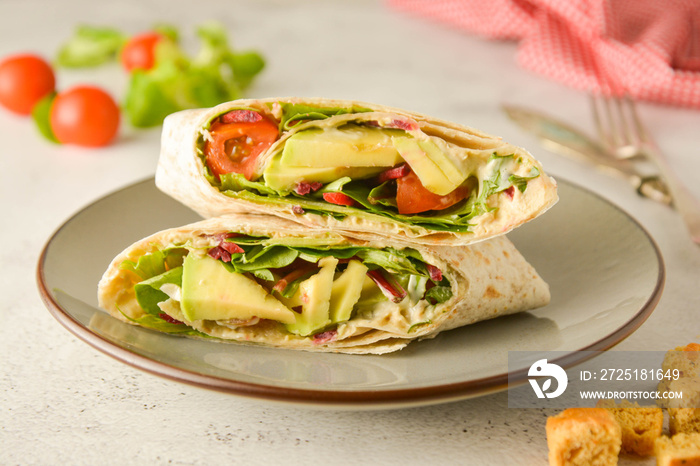 Wraps or torttila. Avocado, vegan wrap sandwiches. Healthy food.