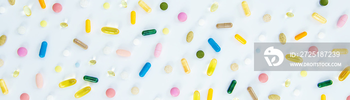 Supplements and vitamins on a white background. Selective focus.