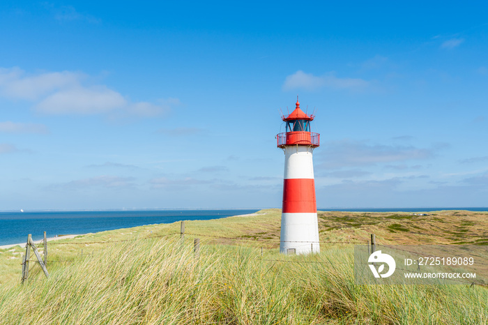 Lighthouse red white on dune. Sylt island – North Germany.