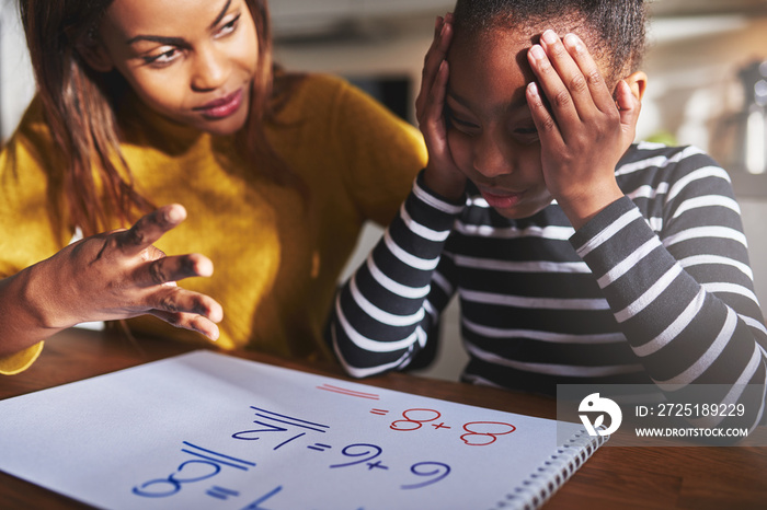 Mother learning child to calculate