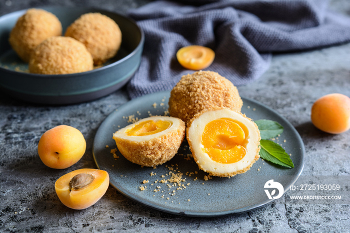 Marillenknödel – sweet dumplings stuffed with apricot and coated with breadcrumbs