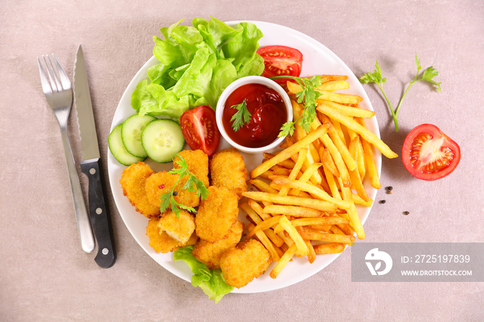 chicken nugget, french fries and lettuce