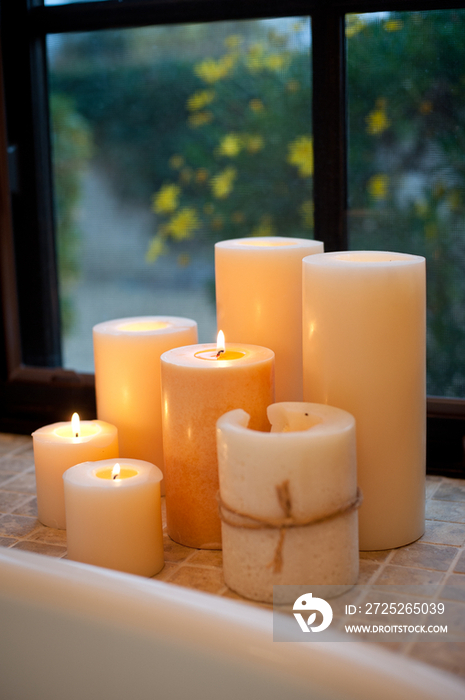 Lit candles in bathroom