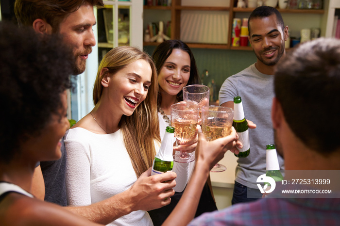 Group Of Friends Enjoying Drinks Party At Home