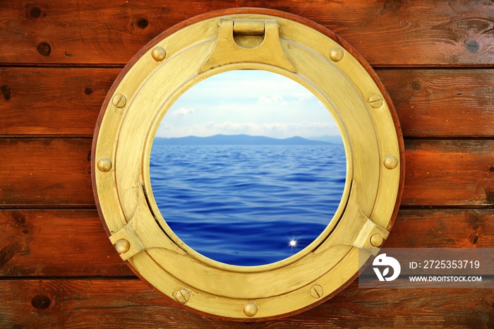 Boat closed porthole with vacation seascape view