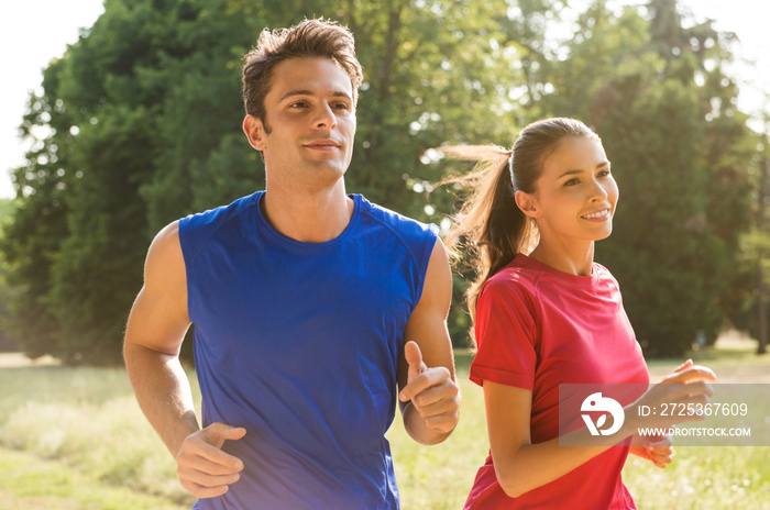 Young Couple Jogging Together