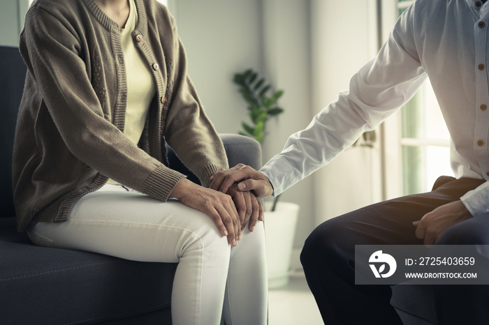 mental health treatment concept. Stressed asian patient talking with personal psychologist in therap