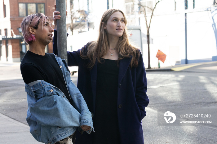 Lgbtqia friends walking in the city.