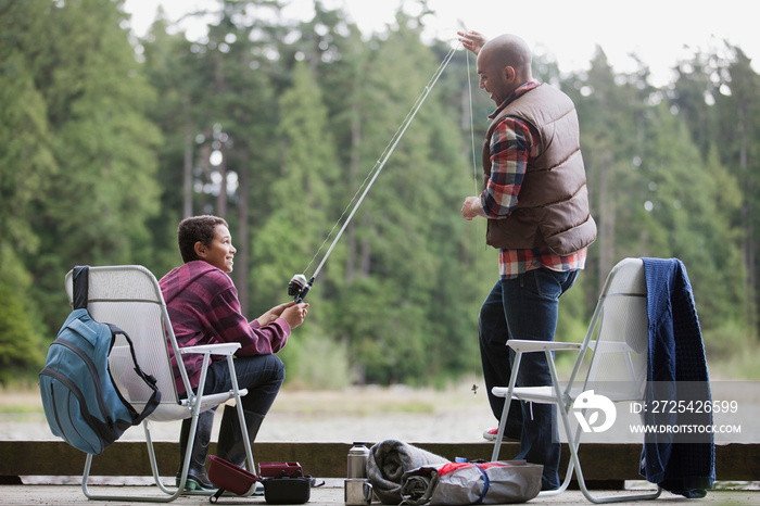 Father and son enjoying fishing together