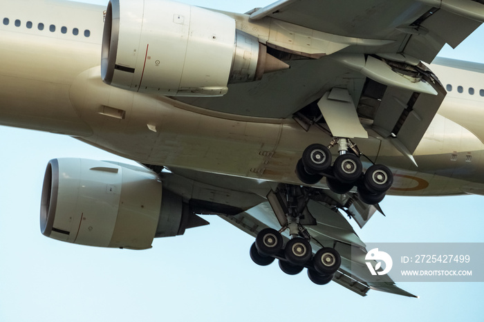 Closeup rubber wheels and chassis of commercial airline. Passenger plane landing or take off. Aerosp