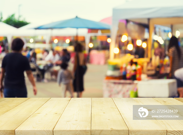 Blurred image of food fairs and food festivals consist of many booth and vendors at food stalls. Peo