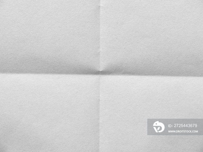 White sheet of paper folded in four