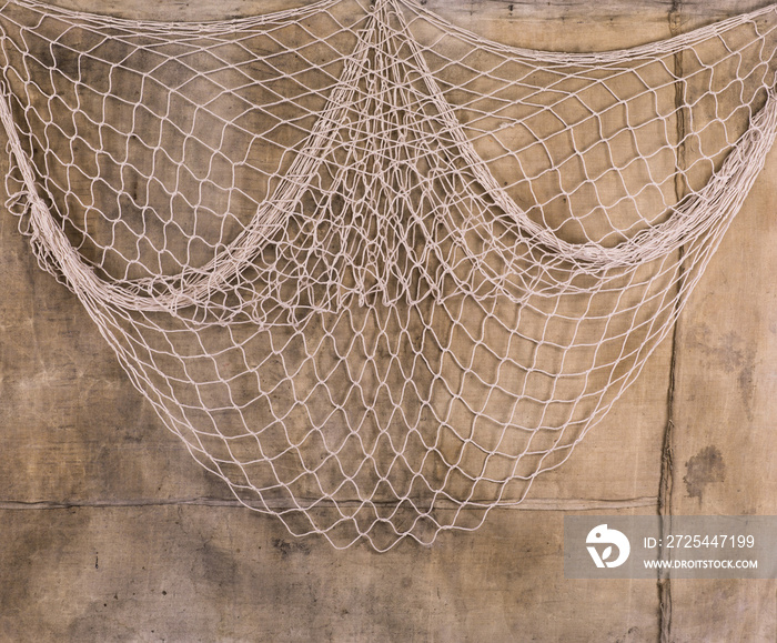fishing net on dirty wall