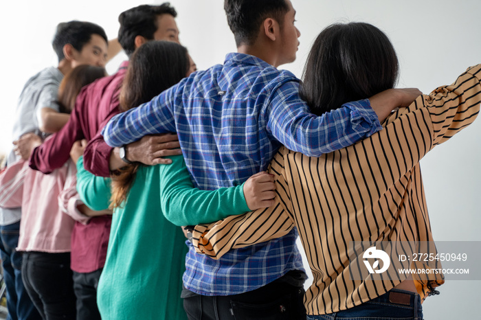 best friend holding hand shoot from behind. solid team together concept