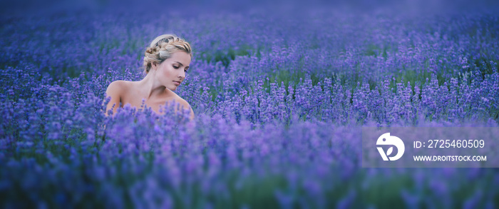 Beautiful young woman n a lavender field