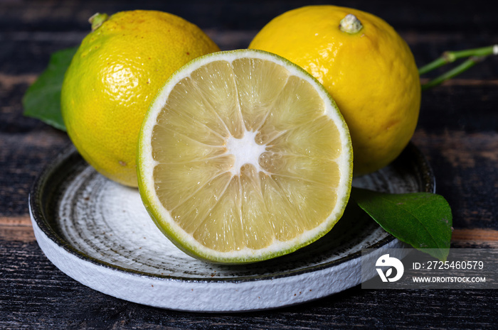 Fresh ripe bergamot orange fruits, fragrant citrus used in earl grey tea, medicine and spa treatment