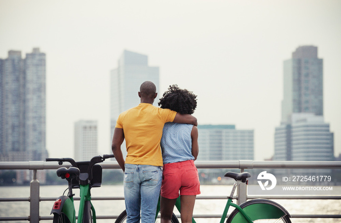 Couple looking at city