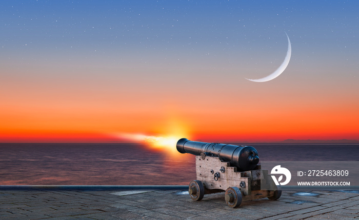 斋月概念-带新月和烟花的斋月卡里姆大炮-带月亮的夜空