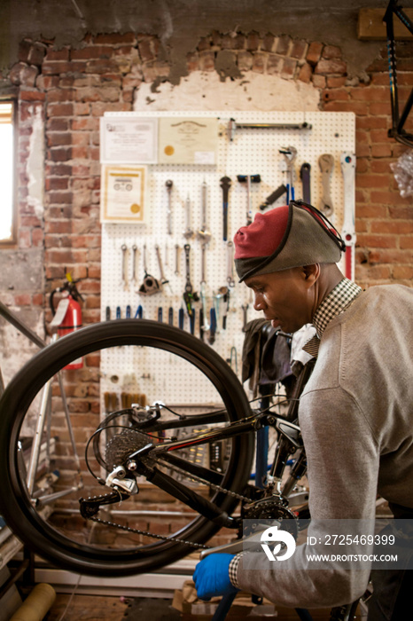 Mechanic fixing bicycle chain