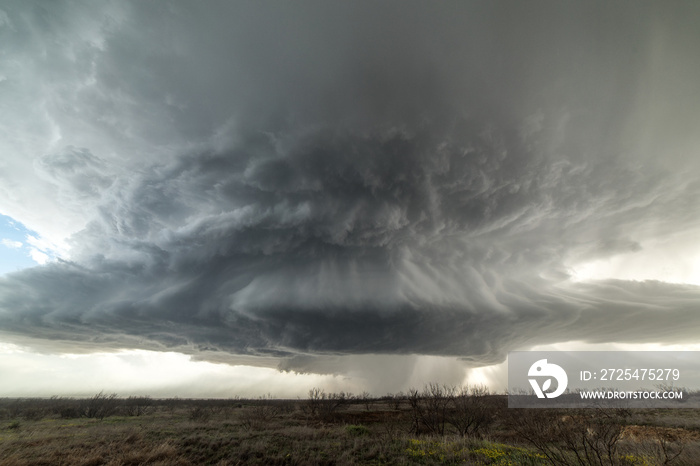 Landscape with massive supercell in the Eastern Texas panhandle, USA. Massive baseball-sized hail fe