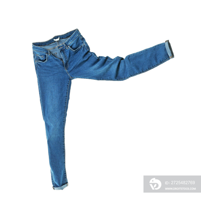 Flying jeans pants on white background