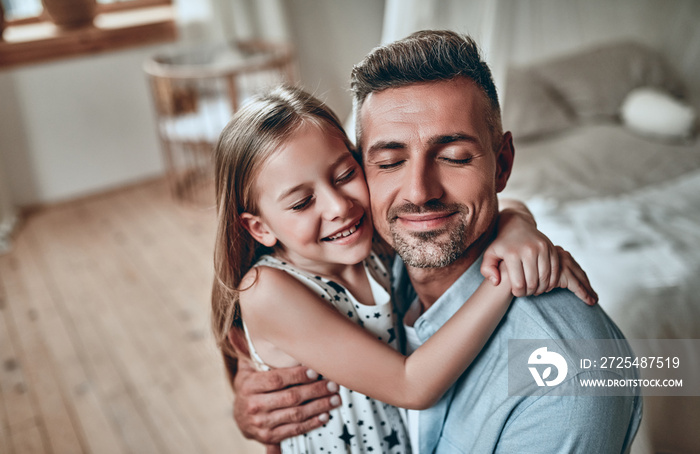 Father and daughter at home