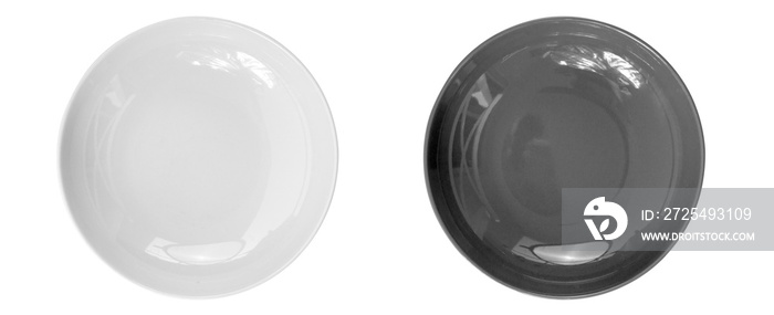 Empty black and white plates isolated on white background