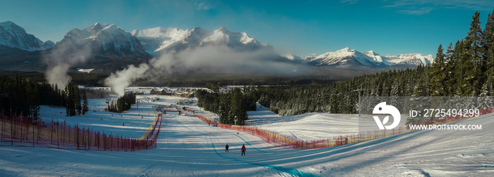 Panoramic view of the finish area in Lake louise ski resort with canadian rockies in the background.