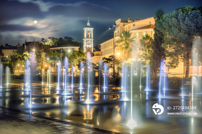 Beautiful fountain on Place Massena in Nice at night time. France