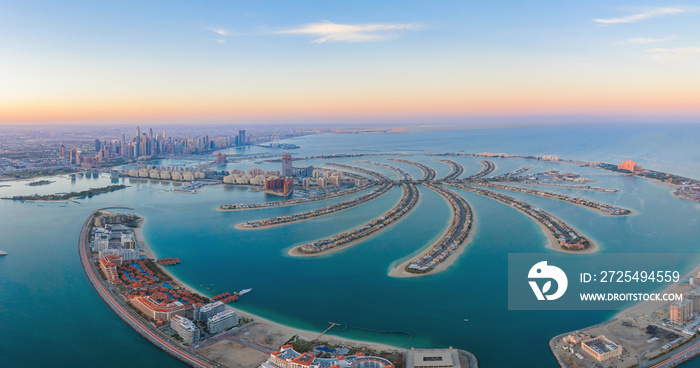 Aerial view of The Palm Jumeirah Island, Dubai Downtown skyline, United Arab Emirates or UAE. Financ