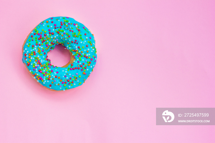 blue donat on a pink background