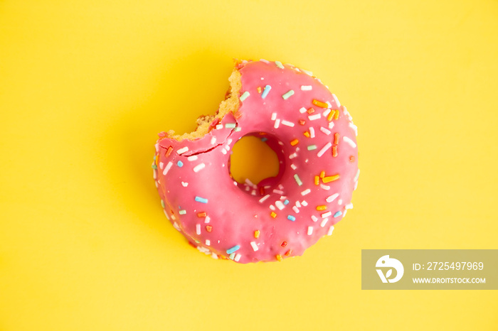 pink donut in colorful background